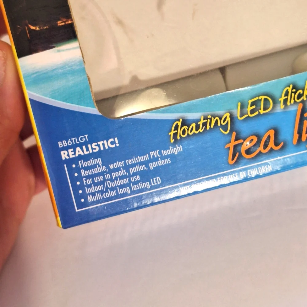 Banana Boat 6 Pack Floating LED Flickering Tea Light Candles Multicolor NIB